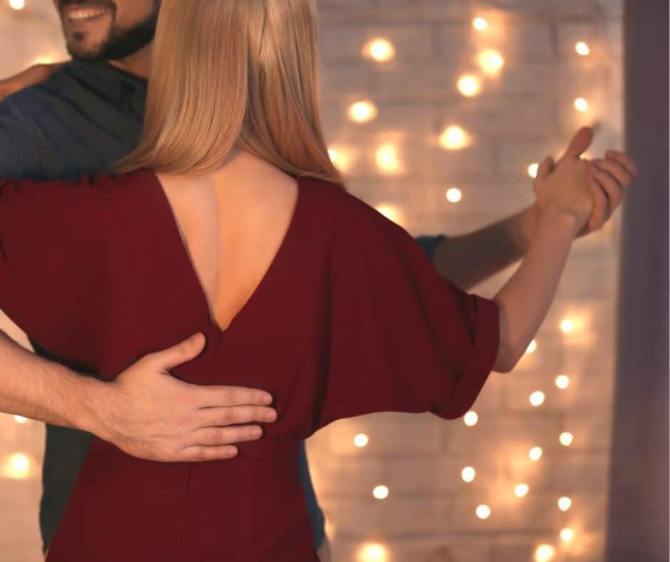 couple dancing at home