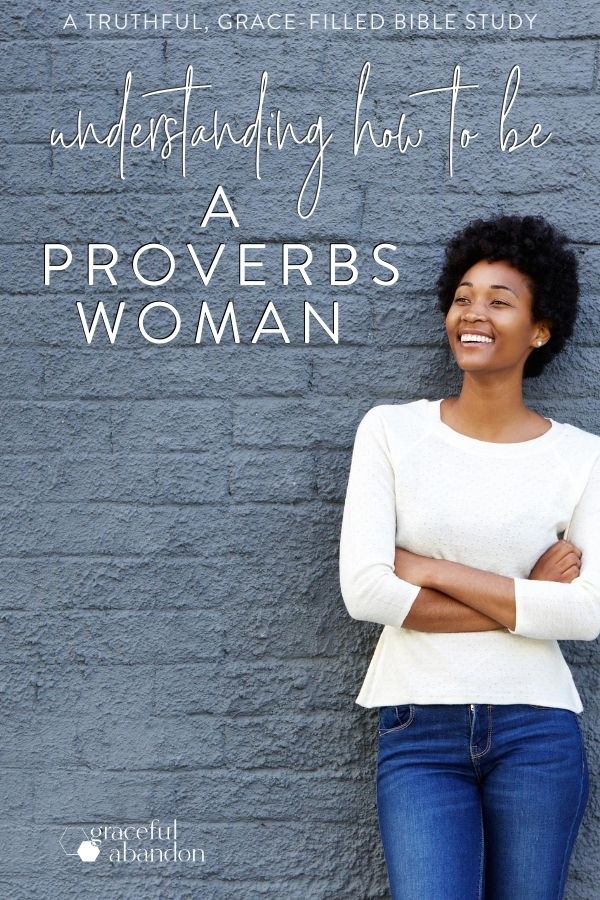 smiling woman against a brick wall with text "understanding how to be a Proverbs woman" a truthful, grace-soaked Bible study by Graceful Abandon.