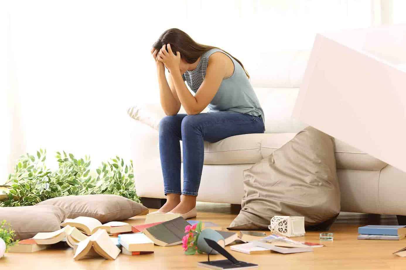 woman overwhelmed by clutter