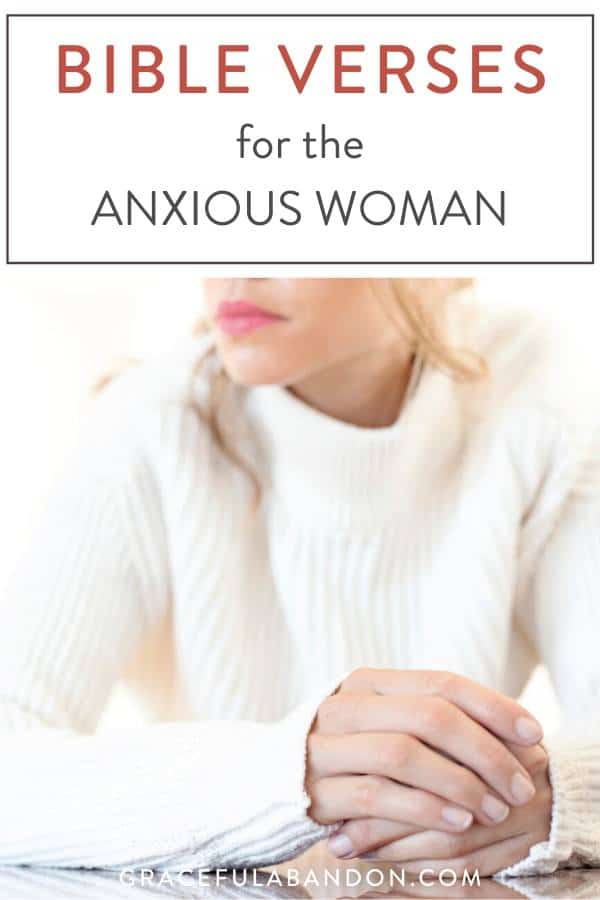 woman clenching hands with anxiety