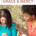 two women praying for God's grace and mercy