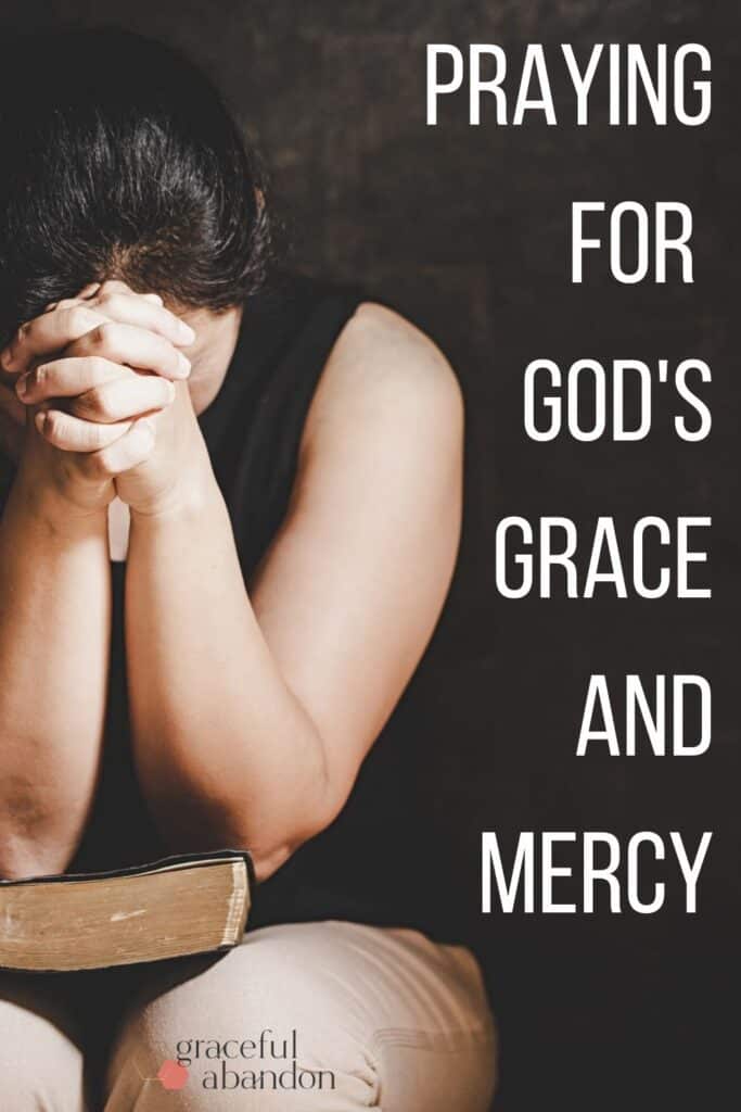 woman with bible praying and text "praying for God's grace and mercy" by Graceful Abandon